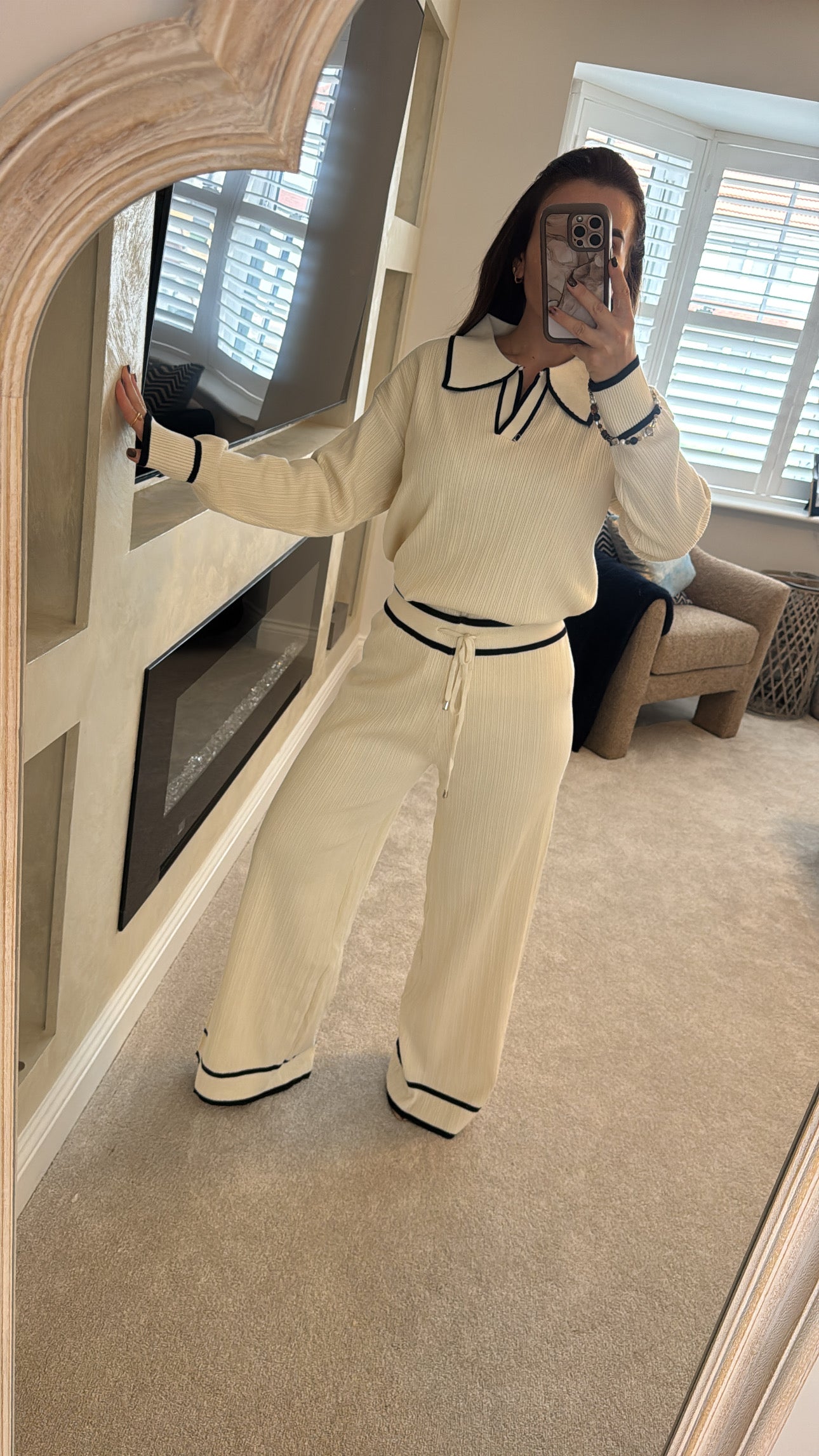 Cream two piece with black trim